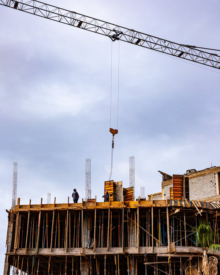services-02 Building under construction with crane in Marrakesh, Morocco showcasing urban development.